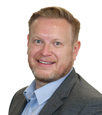 Portrait photograph of Brian Lee, Chief Executive Officer